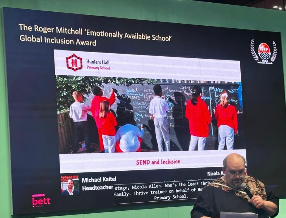 Daniel Sobel, Founder of the IFIP (International Forums of Inclusion Practitioners), presenting the first “Roger Mitchell 'Emotionally Available School' Global Inclusion Awards” to Hunter’s Hall Primary in Dagenham at BETT 2025